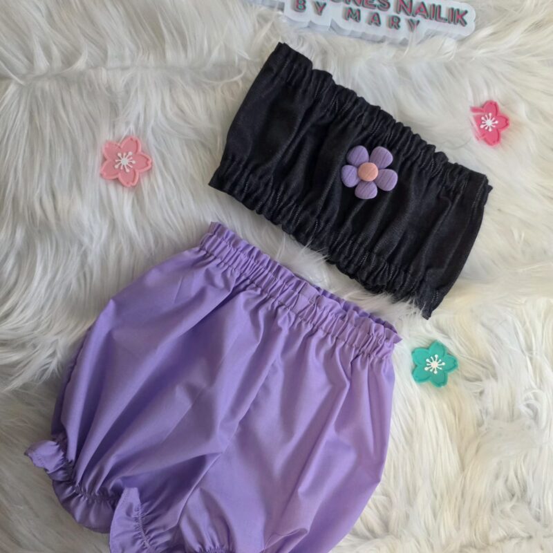 Set Mini Chic para bebé de 9 a 12 meses con top negro y pantalón bombacho lila